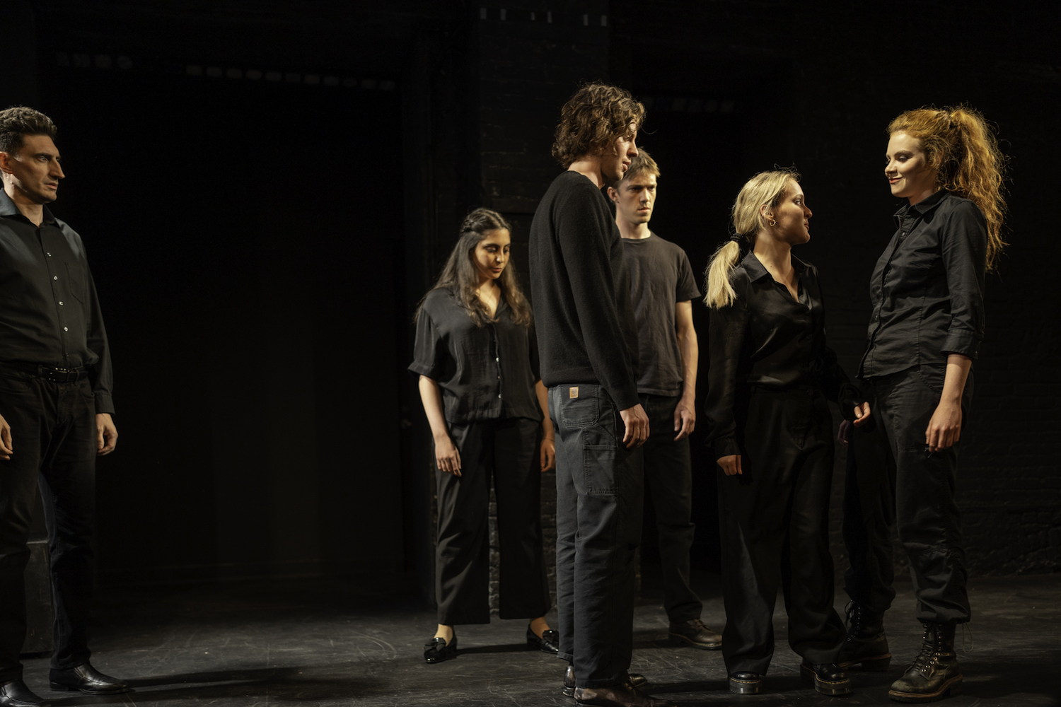 Cast of Hamlet Split Apart performing on stage